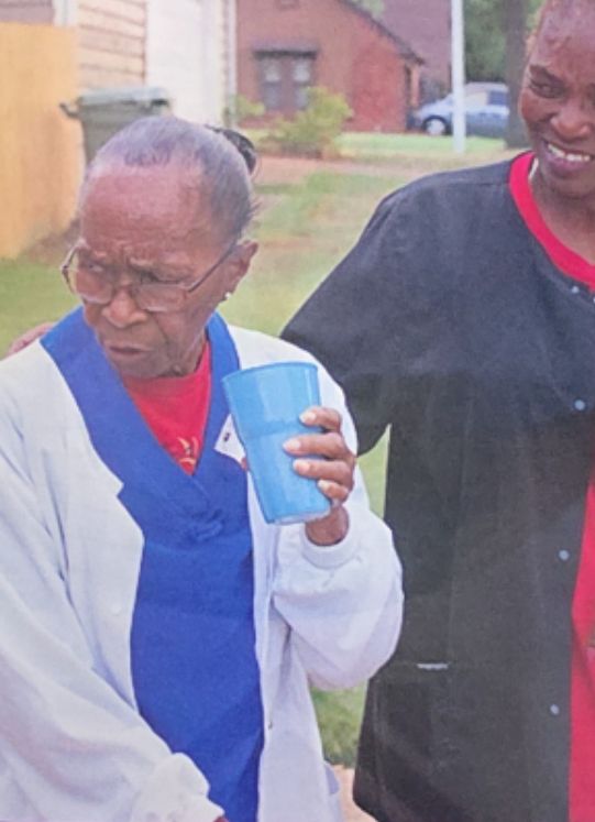 Caregiver providing compassionate care to elderly client